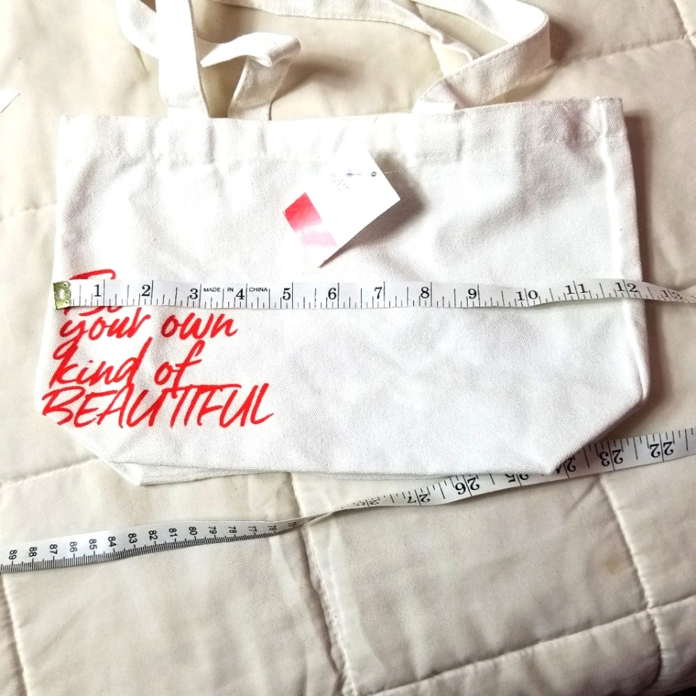 Cute handbag New with tags. See pic for Measuremen